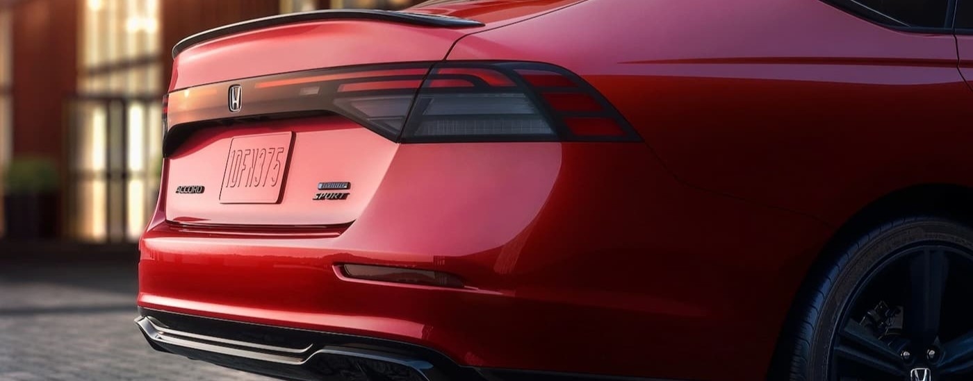 Rear-end of a red 2026 Honda Accord Sport.
