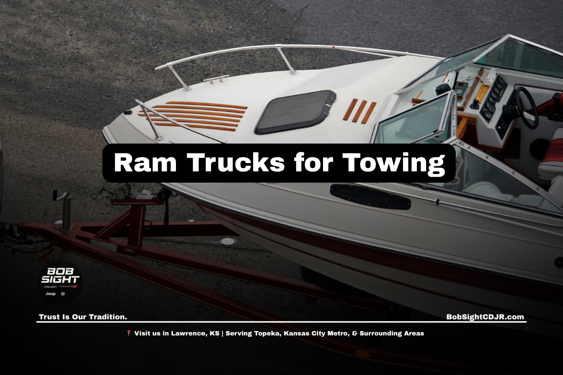 Ram truck towing a boat trailer in Lawrence Kansas at Bob Sight CDJR serving Douglas County and Northeast Kansas drivers