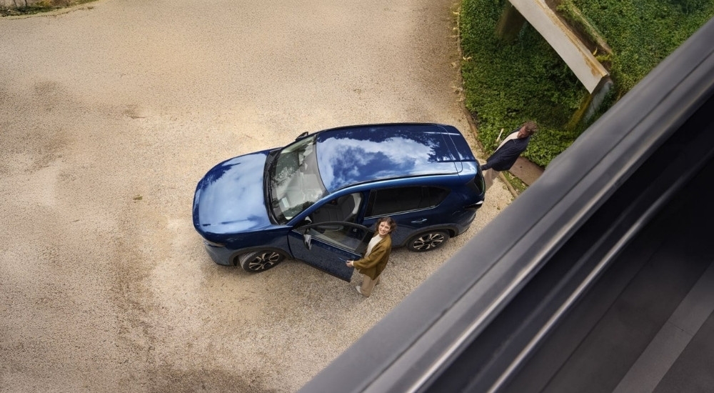 Blue 2026 Mazda CX-5 for sale near Miami Beach parked on a driveway