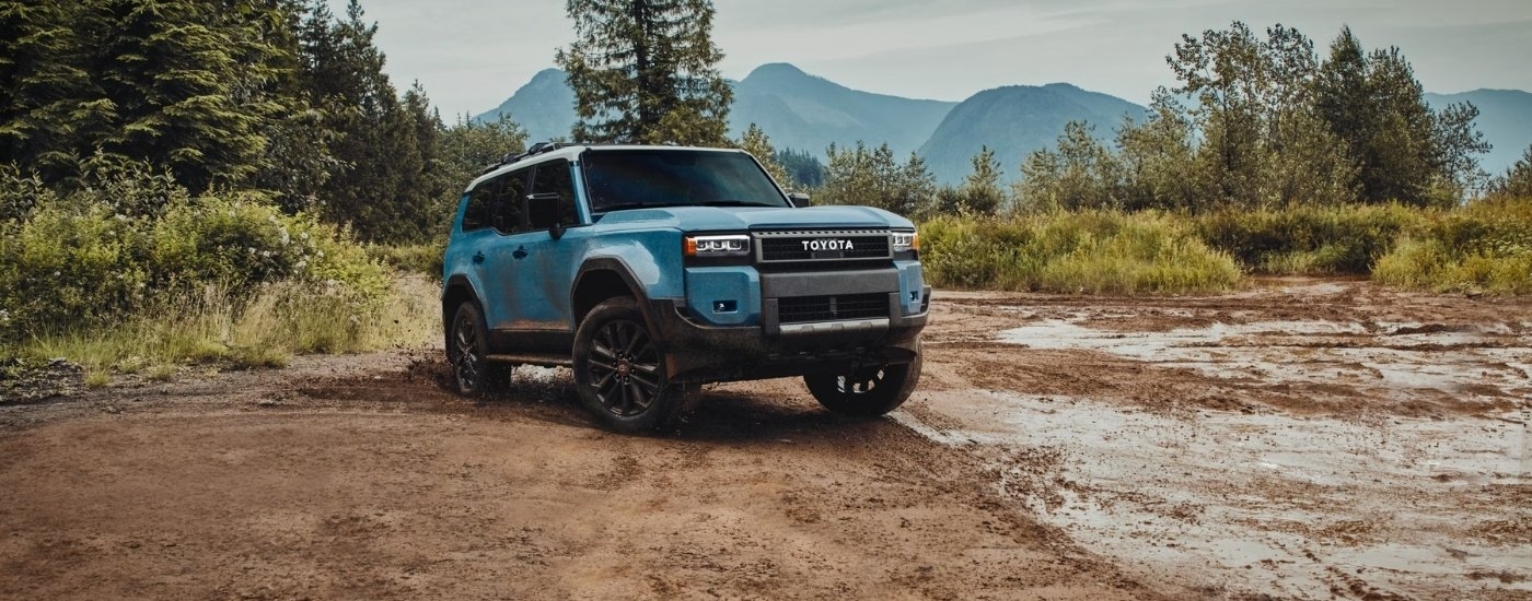 Blue 2025 Toyota Land Cruiser parked off-road