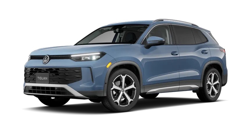 2026 Volkswagen Tiguan SE trim compact SUV in blue shown in a front three-quarter view highlighting upgraded wheels and exterior styling