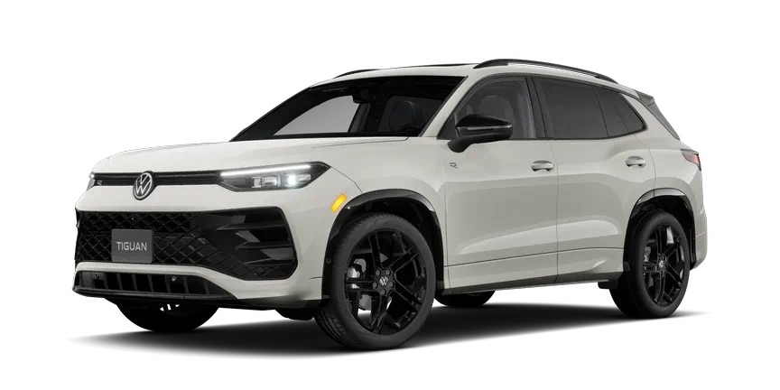 2026 Volkswagen Tiguan SE R-Line Black trim compact SUV with black wheels and sporty R-Line styling shown in front three-quarter view