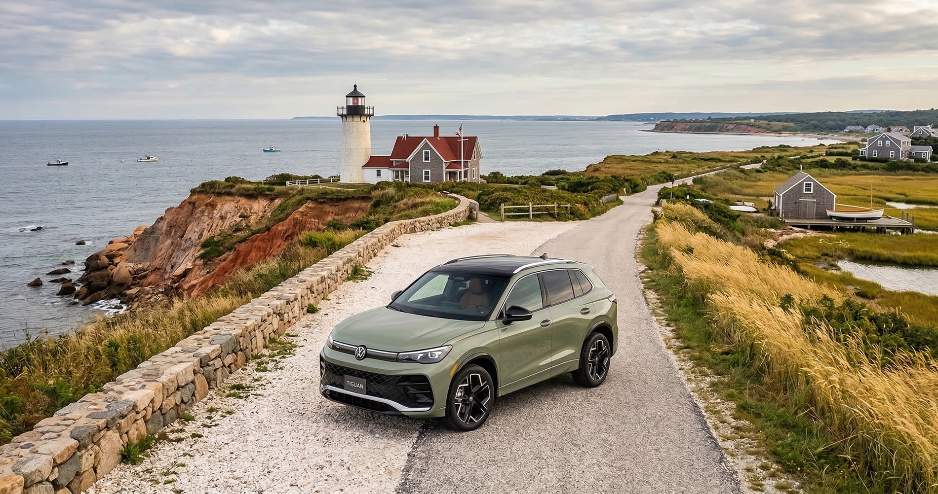 2026 Volkswagen Tiguan parked near a coastal lighthouse along a scenic ocean road showcasing the redesigned compact SUV