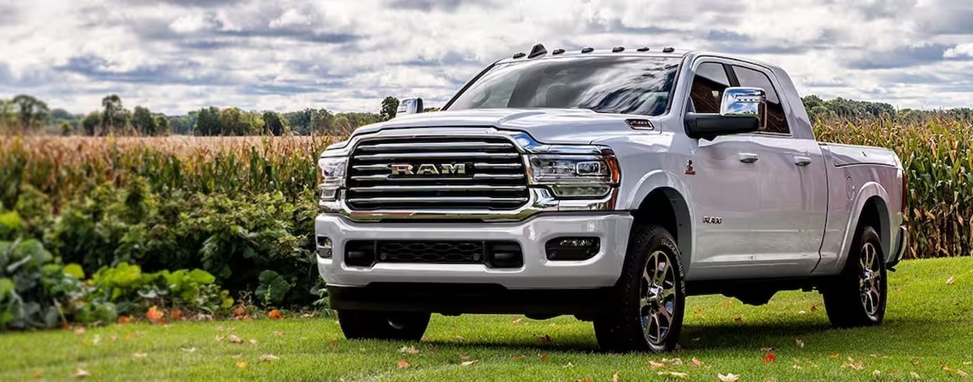 White 2026 Ram 2500 parked off-road.