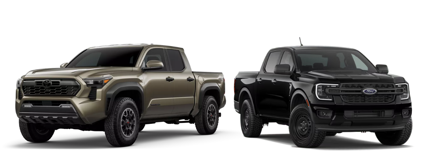 Green 2026 Toyota Tacoma Trail Hunter next to a black 2026 Ford Ranger XL