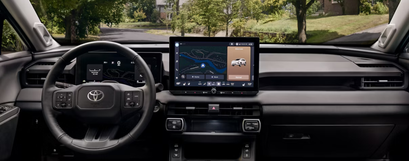 Black interior and infotainment system in a 2026 Toyota RAV4