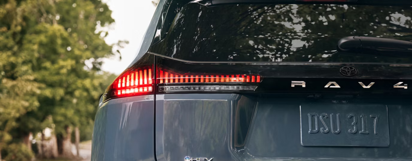 Rear badging on a blue 2026 Toyota RAV4