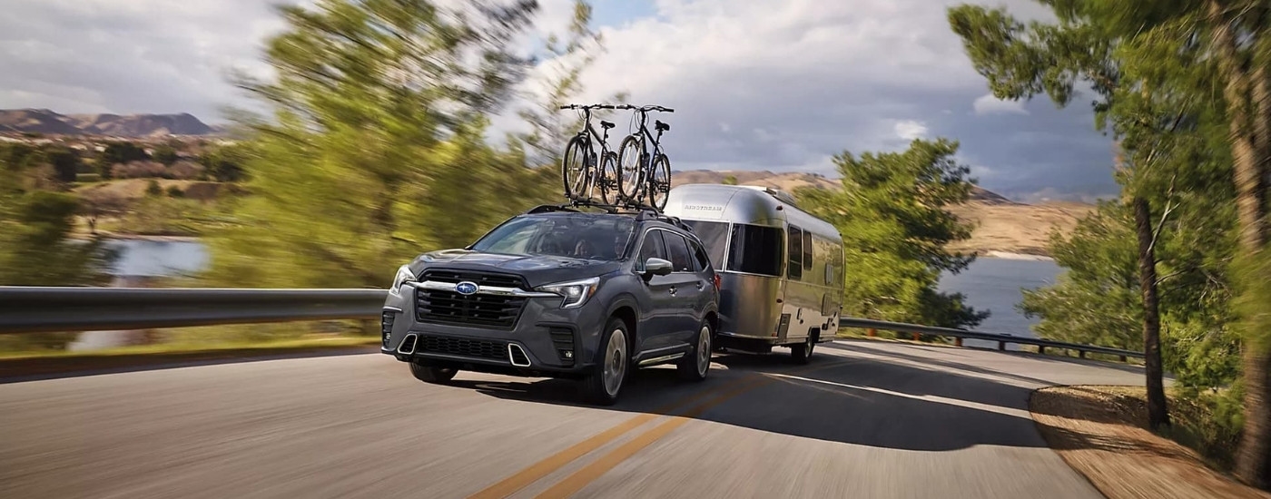 Grey 2023 Subaru Ascent towing a trailer