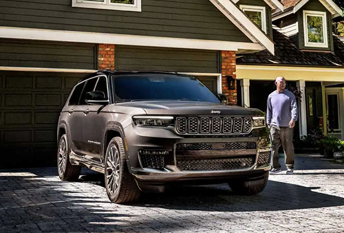 Jeep Grand Cherokee parked in driveway