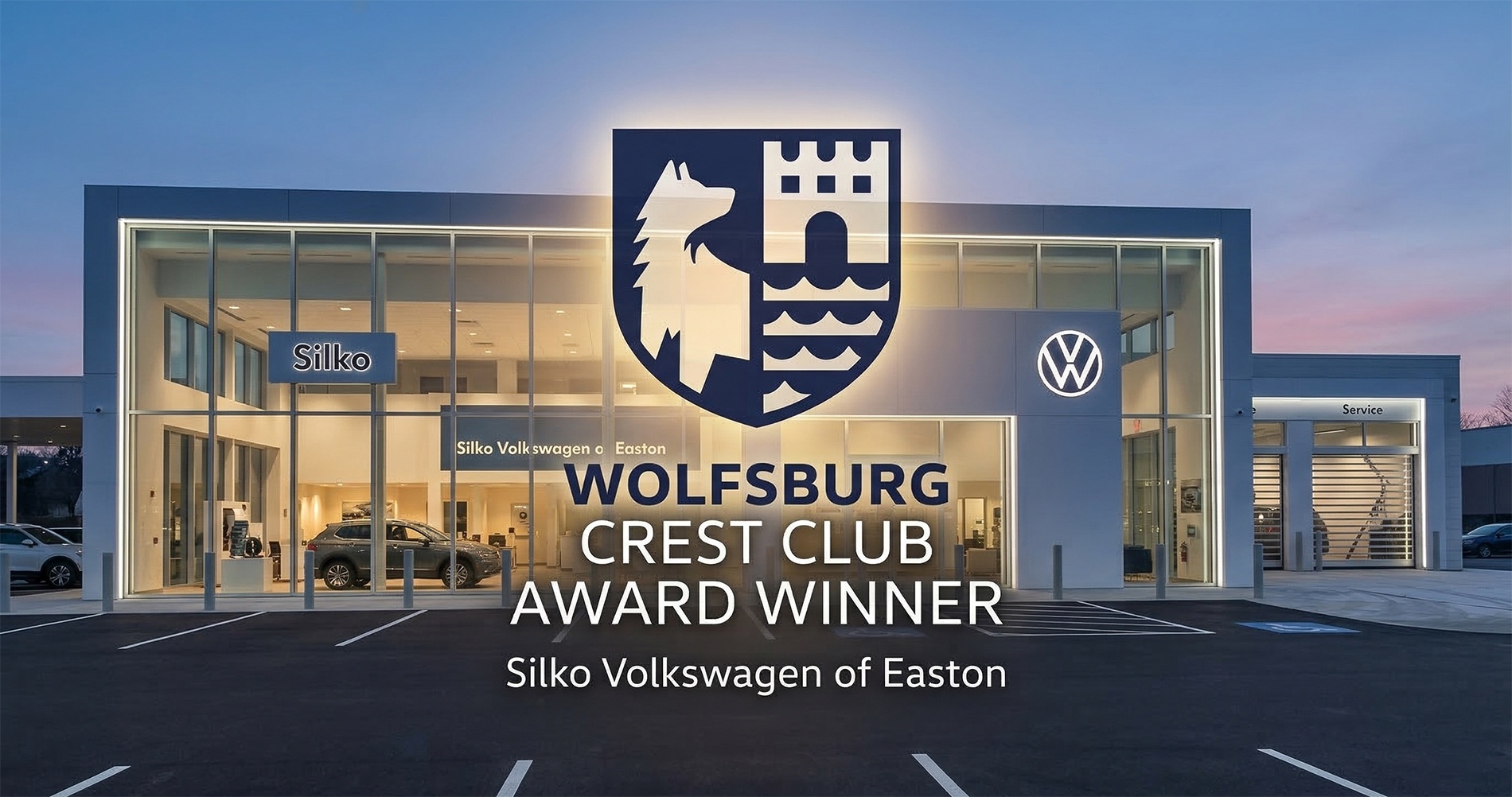 Silko Volkswagen of Easton showroom exterior featuring Wolfsburg Crest Club Award recognition