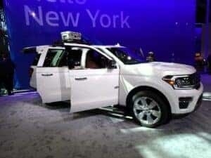 white ford expedition with captain seats