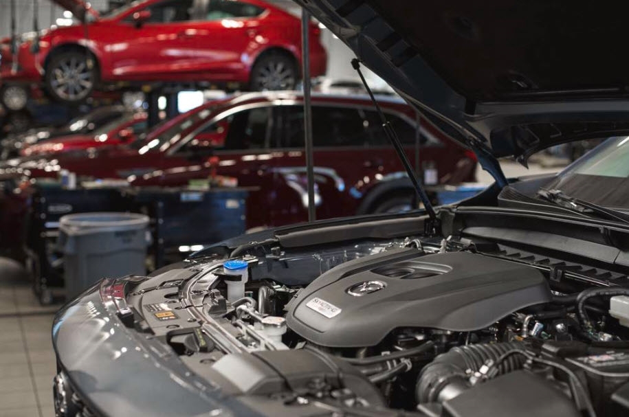 Mazda coolant flush service at Brickell Mazda in Miami, FL - professional cooling system maintenance for South Florida heat