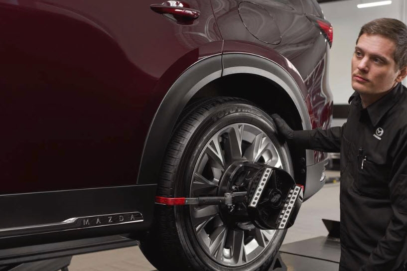 Mazda wheel alignment and tire rotation service at Brickell Mazda in Miami, FL - certified technicians, precision equipment