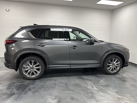 grey 2026 Mazda CX-5 SUV parked at the Bountiful Mazda dealership in Bountiful, UT
