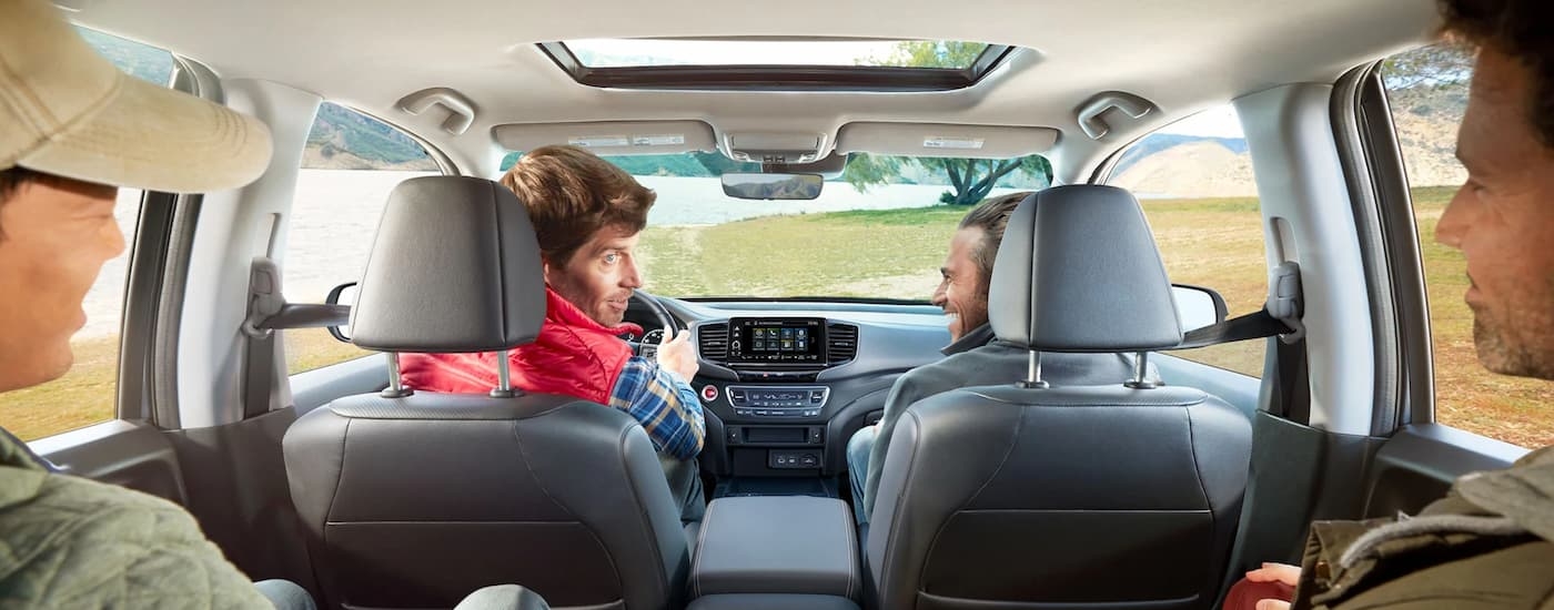 Group of friends driving in a 2026 Honda Ridgeline