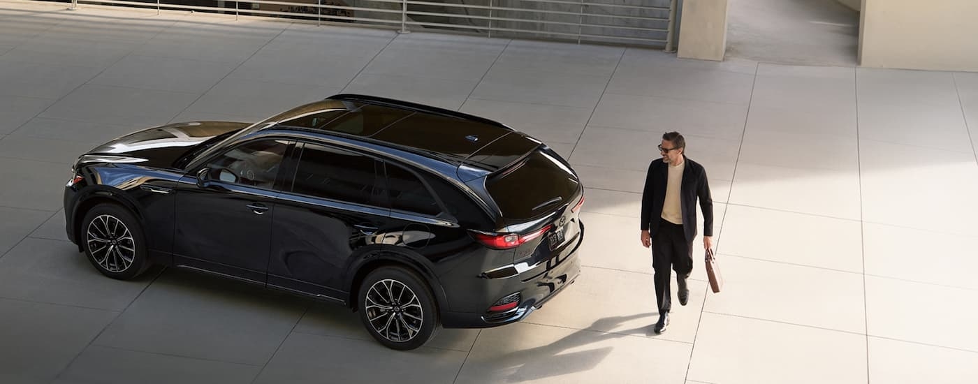 Black 2026 Mazda CX-70 parked at a car dealership