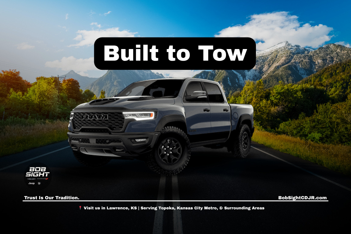 Ram trucks in Lawrence Kansas at Bob Sight CDJR towing boats and trailers for work and recreation across Douglas County