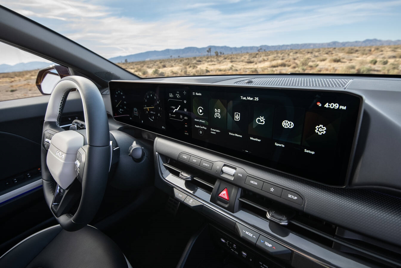 2026 Kia K4 Hatchback interior showing dual 12.3-inch screens, SynTex faux leather seats, and spacious rear cargo area