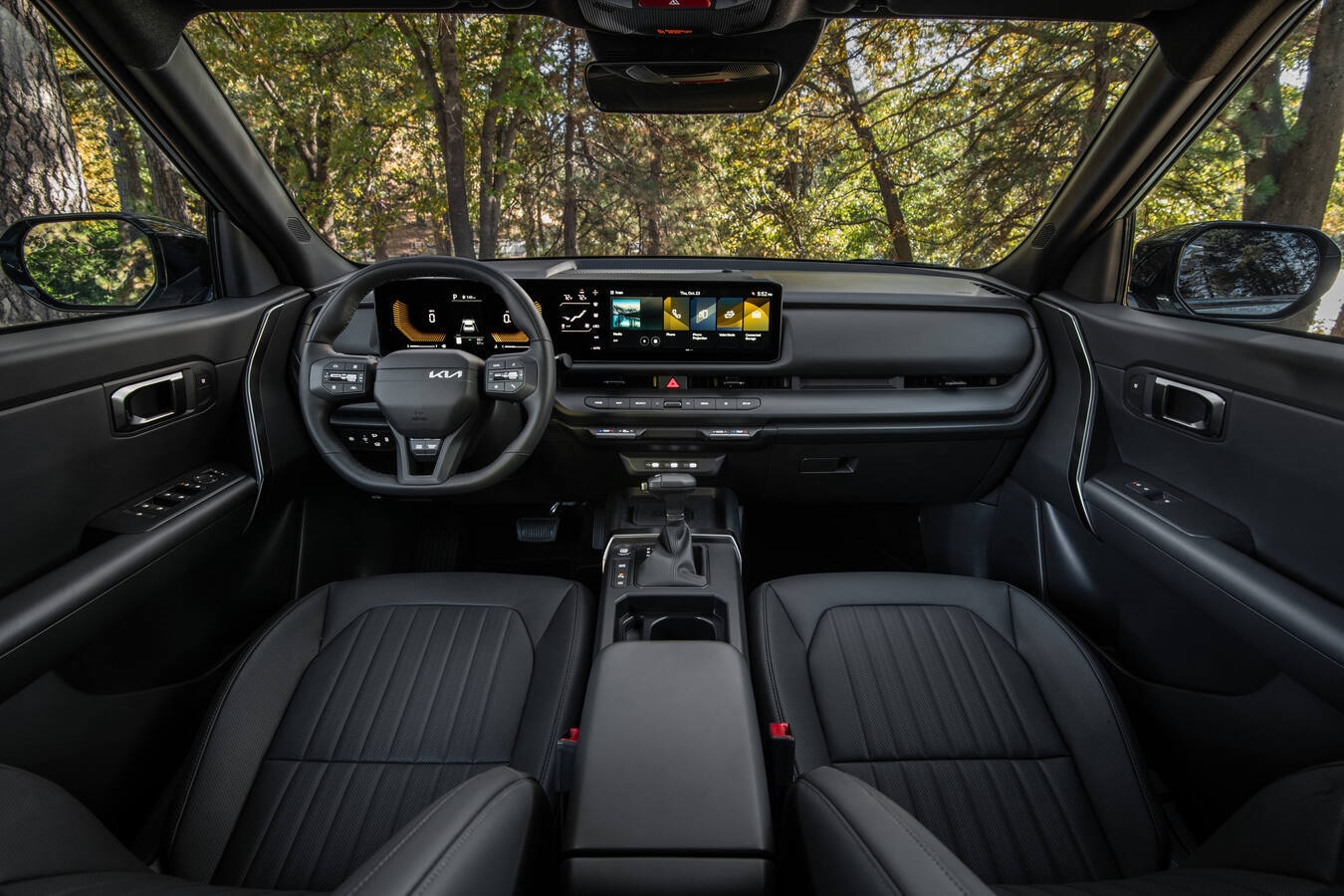 2027 Kia Seltos Hybrid interior showing column-mounted gear selector and dual 12.3-inch digital displays, available in Denver late 2026