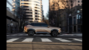 2027 Kia Seltos X-Line Turbo in rugged terrain near Denver Colorado, showing 8.1-inch ground clearance, black 19-inch wheels and Multi-Mode AWD capability