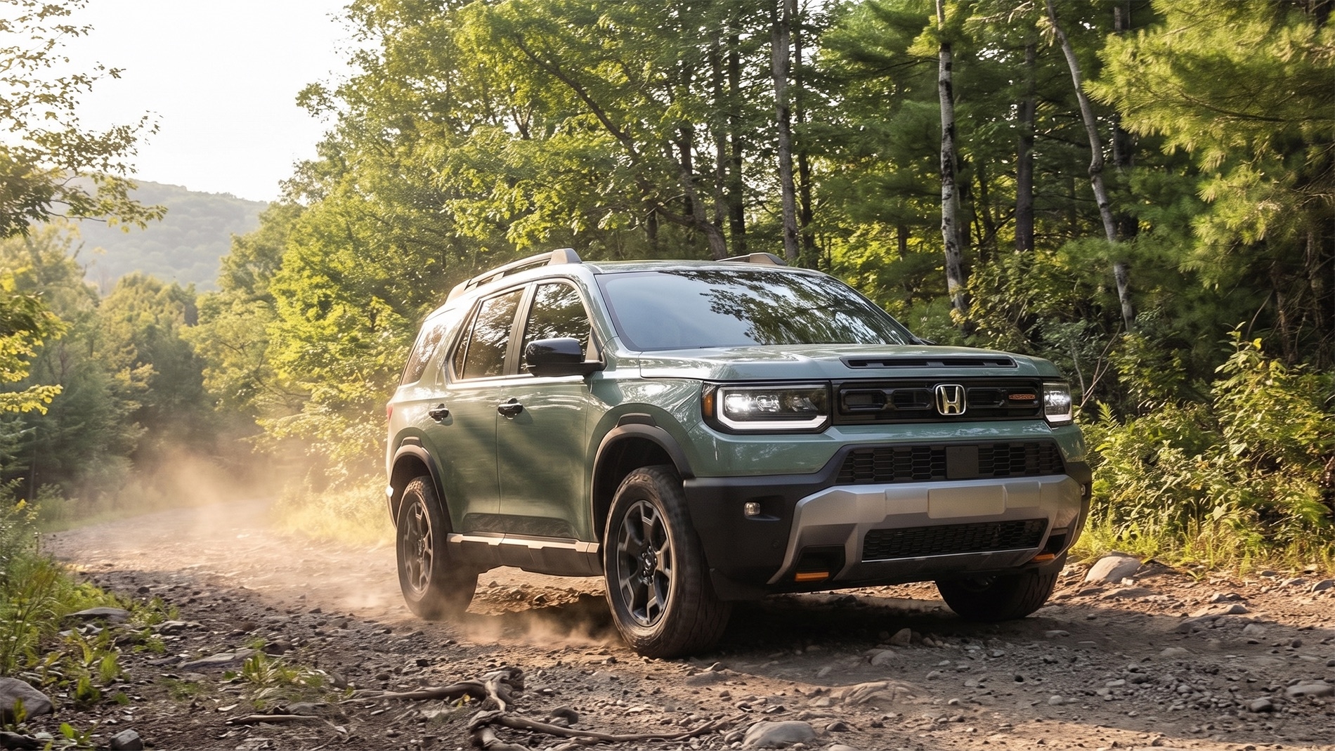 2026 Honda Passport TrailSport driving on a rugged dirt road through the Catskill Mountains, surrounded by dense forest with a small stream nearby, kicking up light dust as it navigates uneven terrain under soft natural daylight