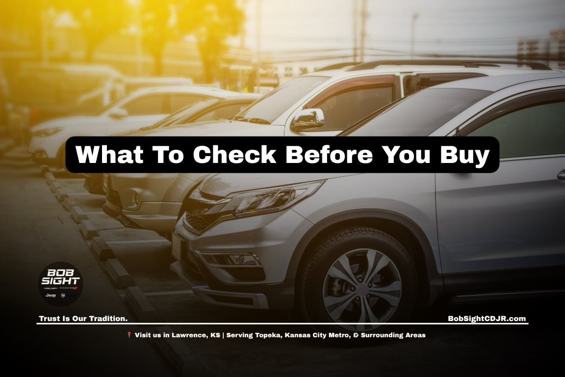used car inspection at a dealership in Lawrence Kansas showing exterior and interior condition checks before buying