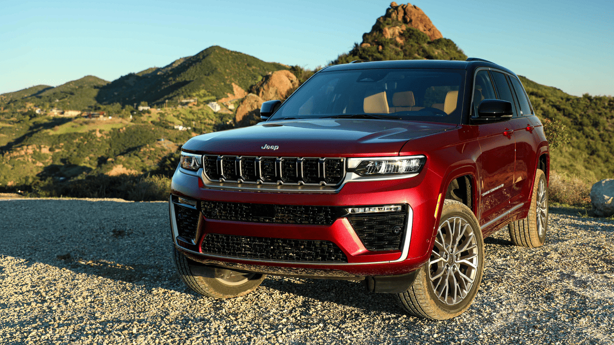 2026 Ram 1500 in blue with black RAM grille, hood stripes, crew cab body, and blacked-out wheels — a top pickup competitor to the Ford F-150 available in Margate FL