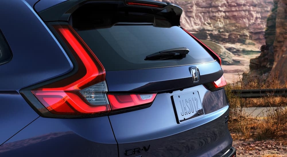 Rear brake lights on a dark blue 2026 Honda CR-V