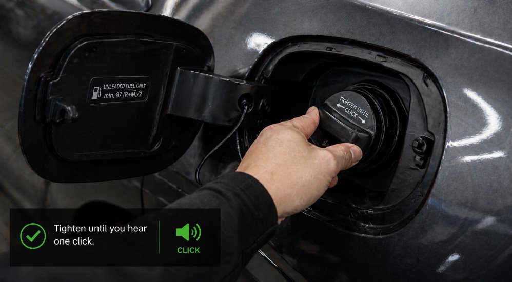 Mazda CX-5 instrument cluster showing the amber check engine light illuminated