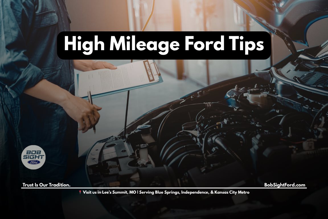 High mileage Ford vehicle maintenance service in Lee’s Summit Missouri with technician inspecting engine components for long term reliability