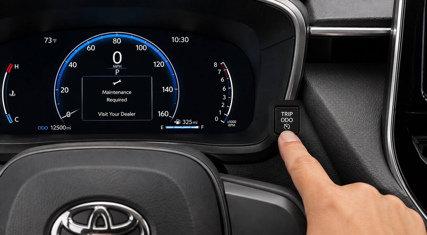 Hand pressing the trip meter ODO button on a Toyota Corolla dashboard to reset maintenance light