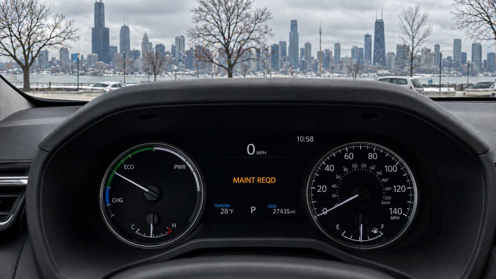 Toyota Camry instrument cluster showing the amber MAINT REQD message illuminated