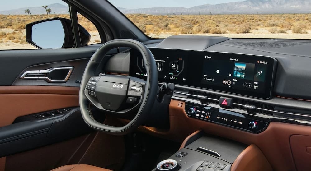 Black and brown dash in a 2026 Kia Sportage.