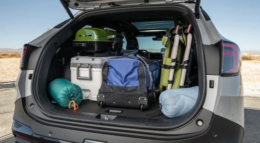 Rear cargo area in a gray 2026 Kia Sportage.