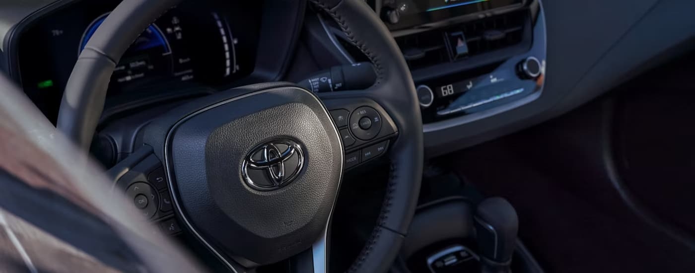 Steering wheel and center console in a 2026 Toyota Corolla
