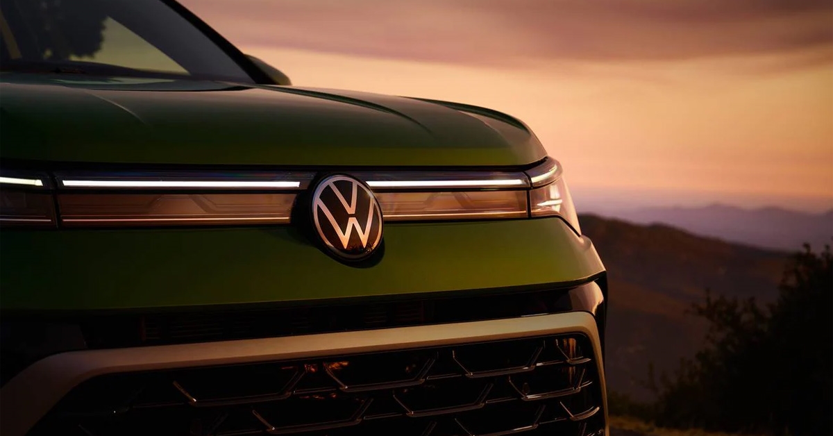 2026 Volkswagen Taos SUV with illuminated front emblem and LED light bar at sunset