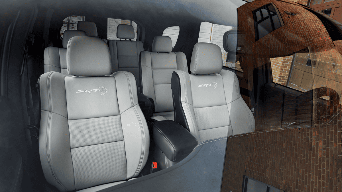 2026 Dodge Durango SRT interior in Margate FL with gray leather second and third-row seats embroidered with SRT Hellcat logo and black center console