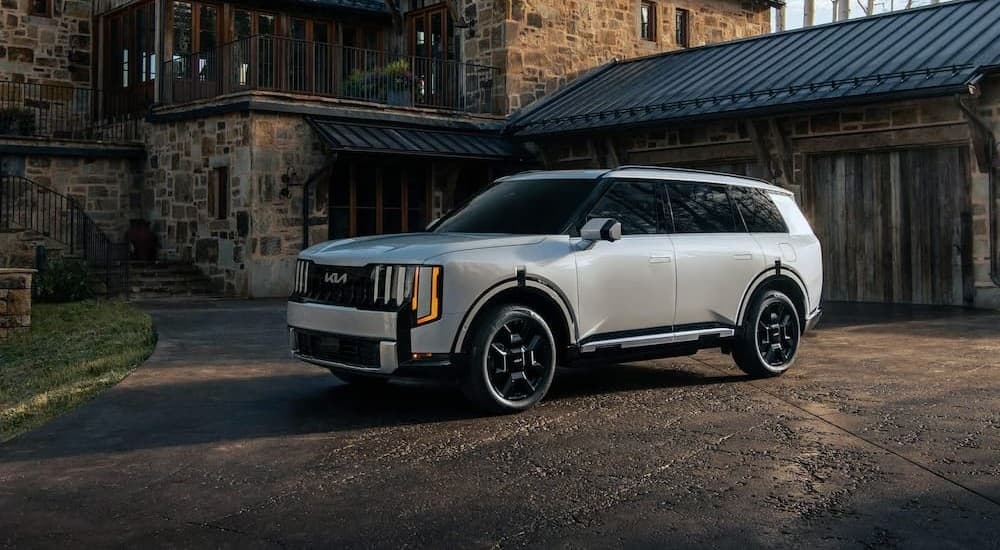 A silver 2027 Kia Telluride parked on a driveway.