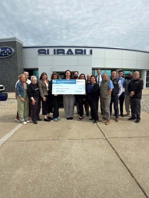 Castle Subaru Portage presenting donation to Save the Dunes