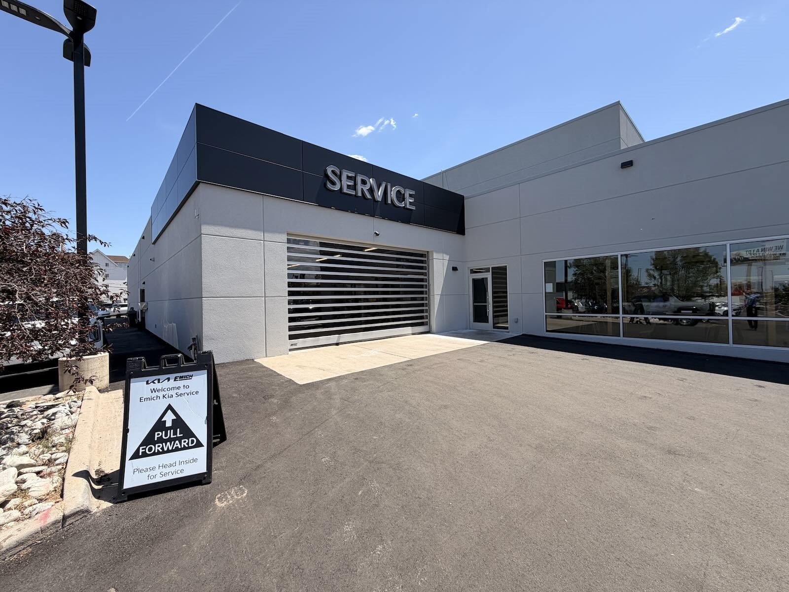 Modern Kia dealership service waiting area near Aurora Colorado