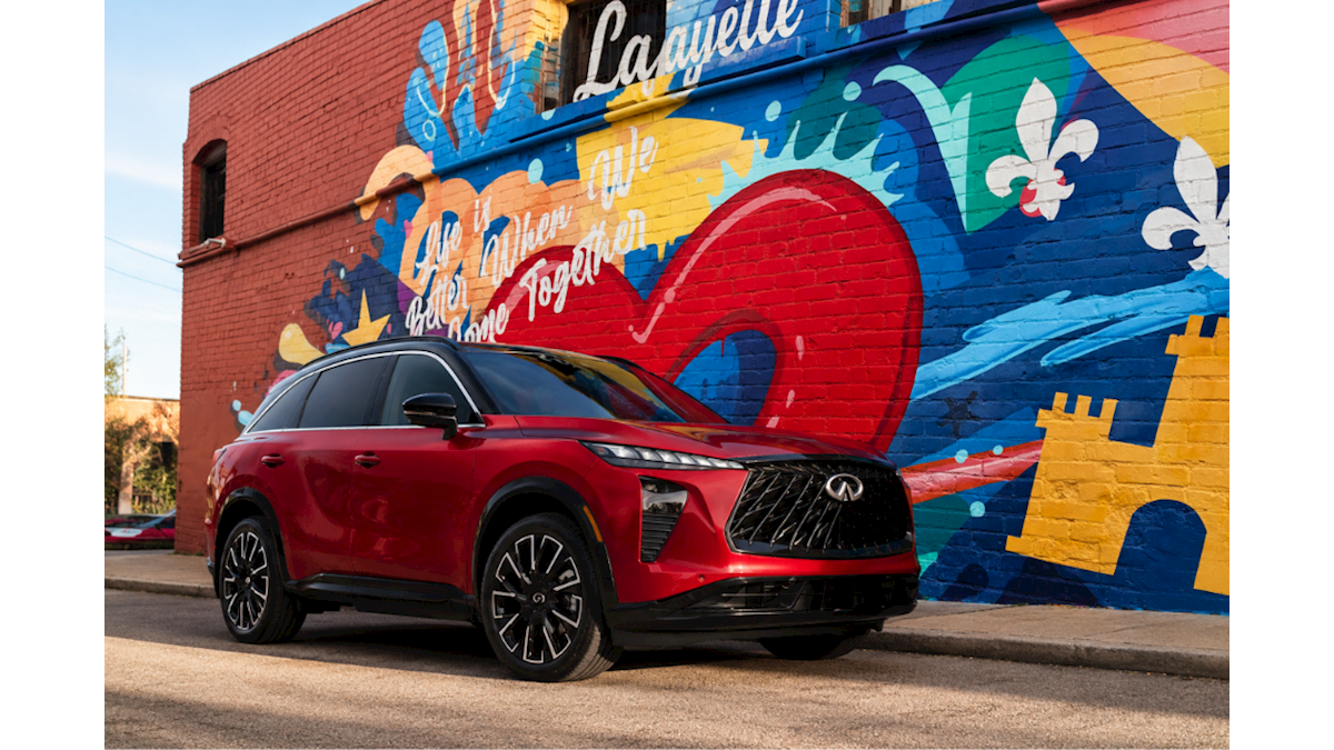2027 INFINITI QX65 in front of Lafayette mural in Louisiana