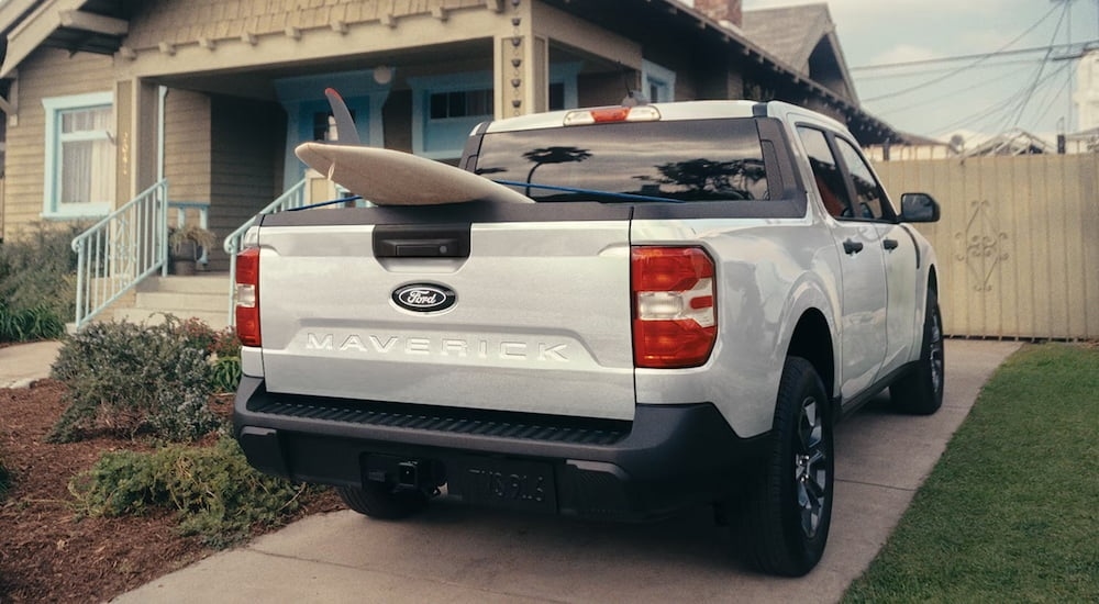 Rear of a white 2026 Ford Maverick parked on a driveway.
