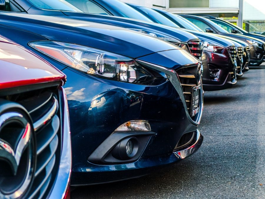 First time car buyer reviewing checklist at McKenna Preowned in Norwalk