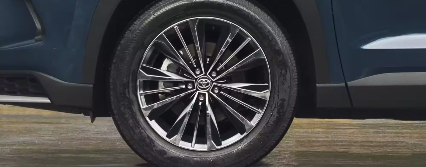 Wheel on a blue 2026 Toyota Grand Highlander