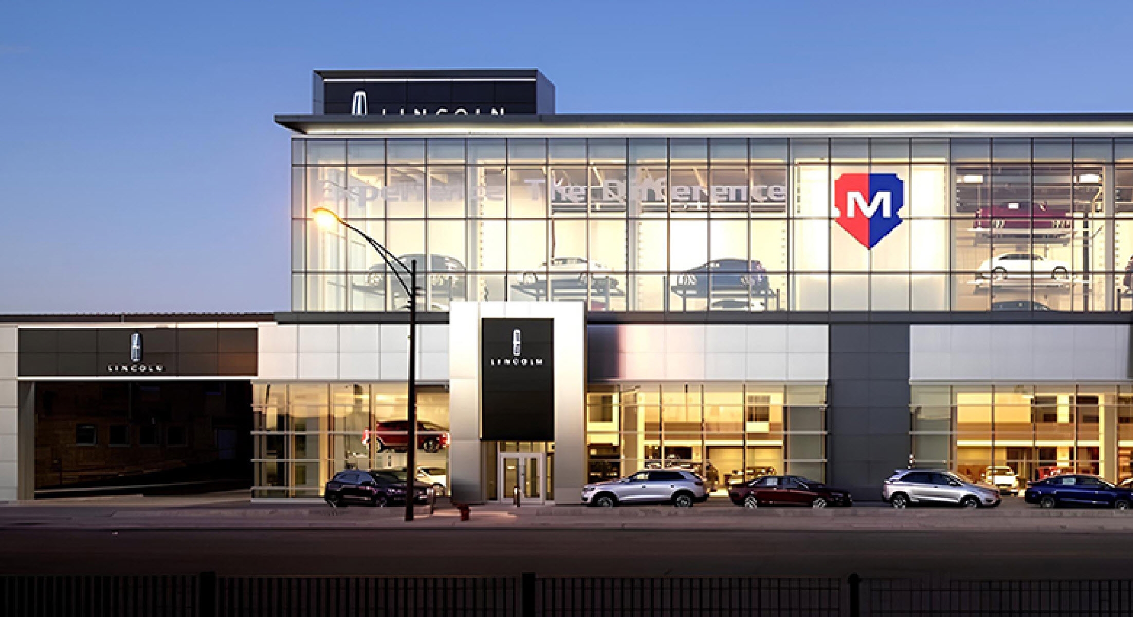 Murgado Lincoln of Chicago dealership on Elston Ave at dusk