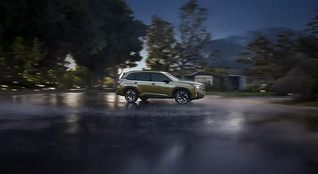 Subaru Forester Hybrid driving through varied terrain