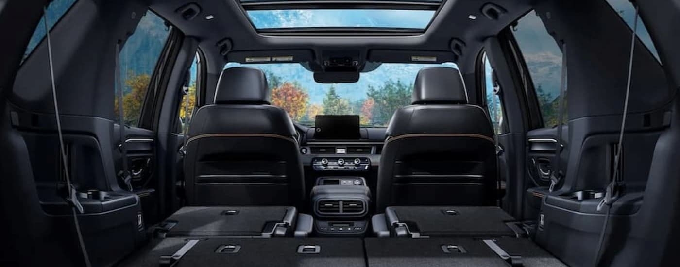 Black interior and dash in a 2026 Honda Pilot.