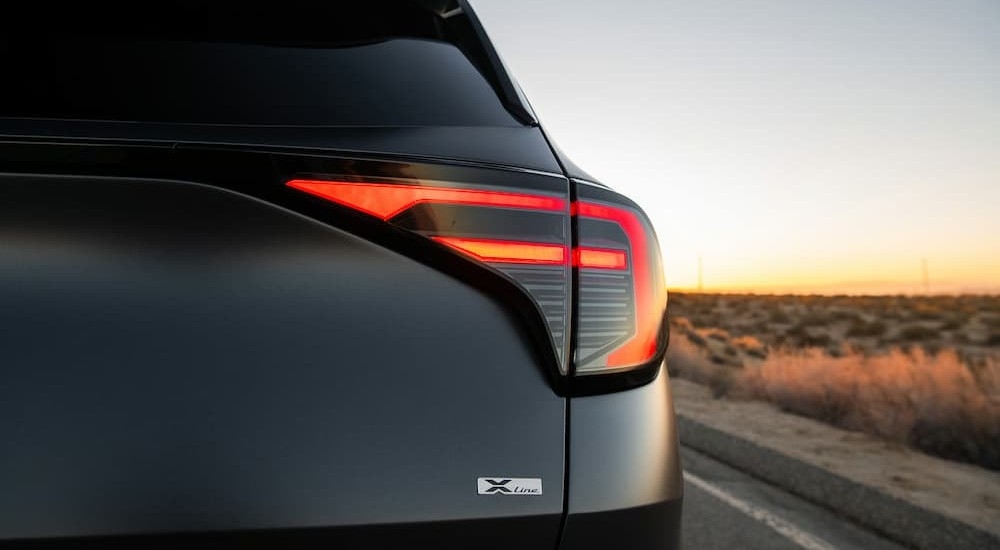 Close-up of a taillight on a gray 2026 Kia Sportage Plug-In Hybrid.