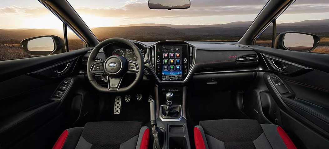 2026 Subaru WRX on the road highlighting EyeSight Driver Assist Technology and everyday versatility