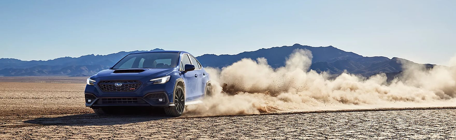 2026 Subaru WRX profile side view showing aerodynamic body lines and aggressive stance